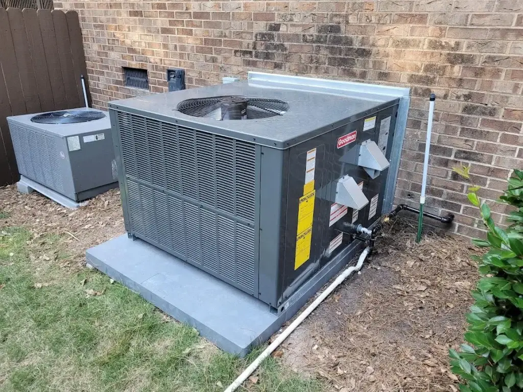 Residentail package HVAC unit installed on a home
