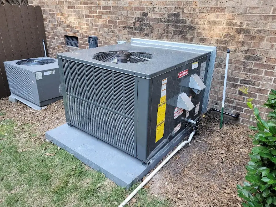Residentail package HVAC unit installed on a home